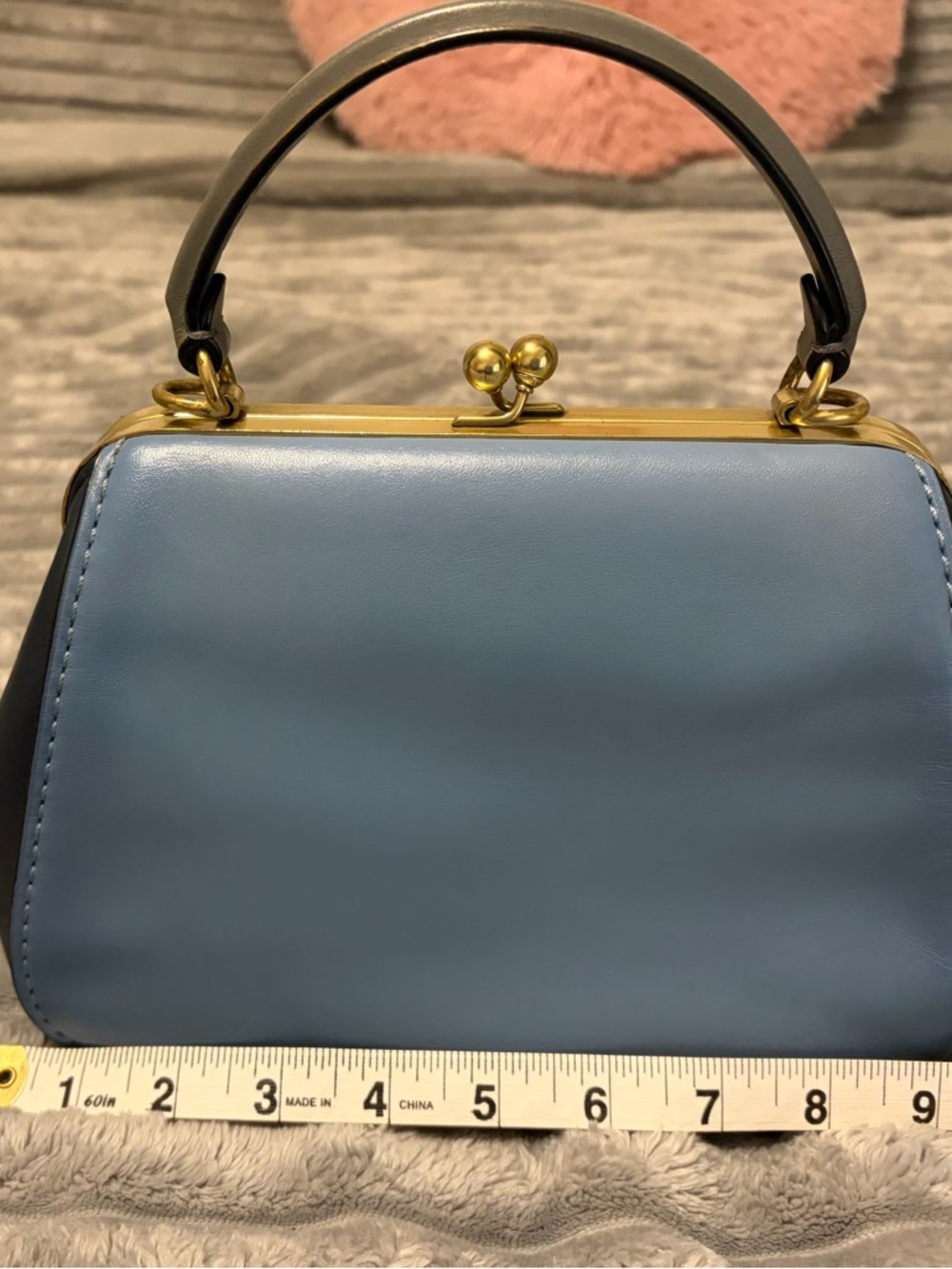 Coach 1941 kisslock frame bag.
